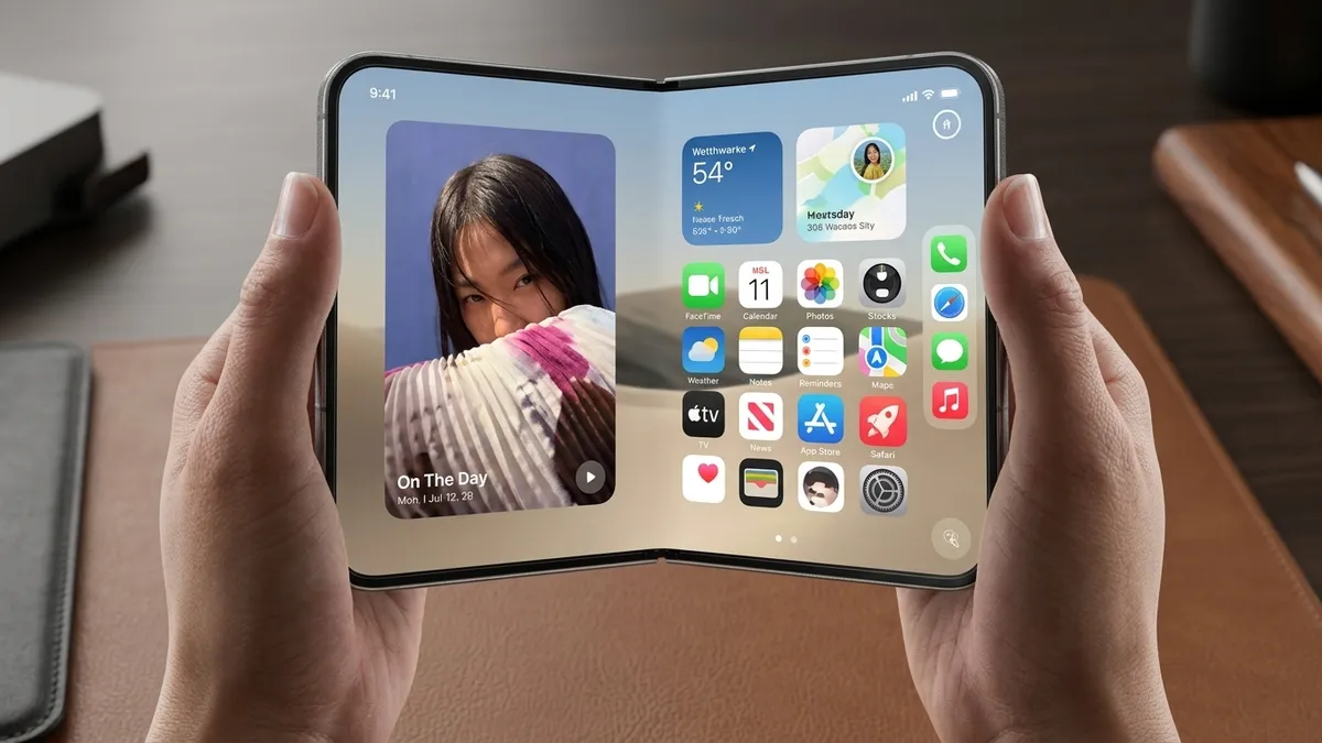 iPhone Duo foldable iPhone opened in hand showing home screen